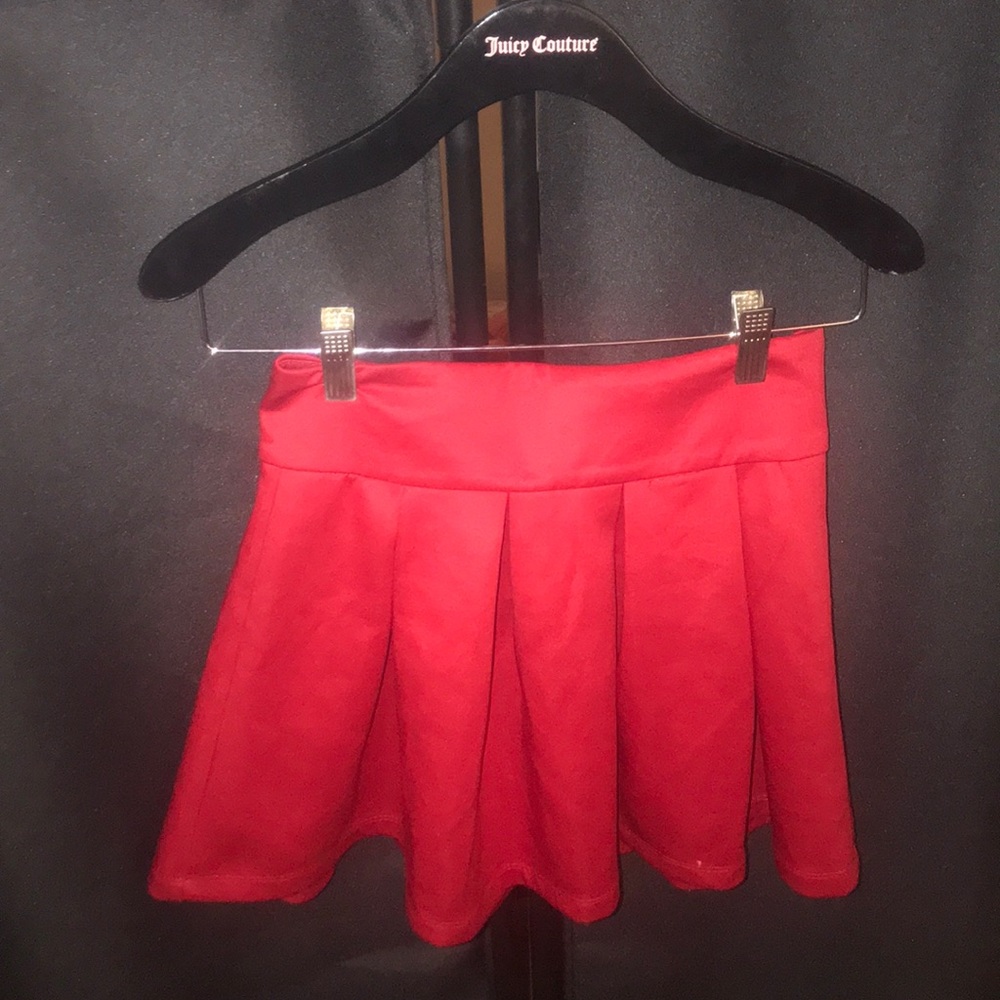 Red high waisted pleated skirt